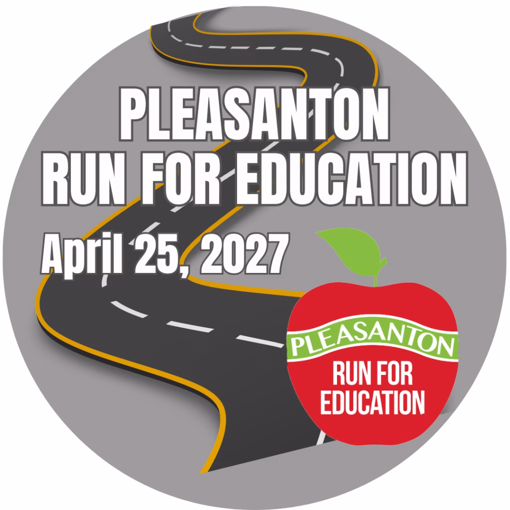 A graphic for the Pleasanton Run for Education on April 25, 2027, featuring a winding road and a red apple with a green leaf labeled Pleasanton Run for Education.